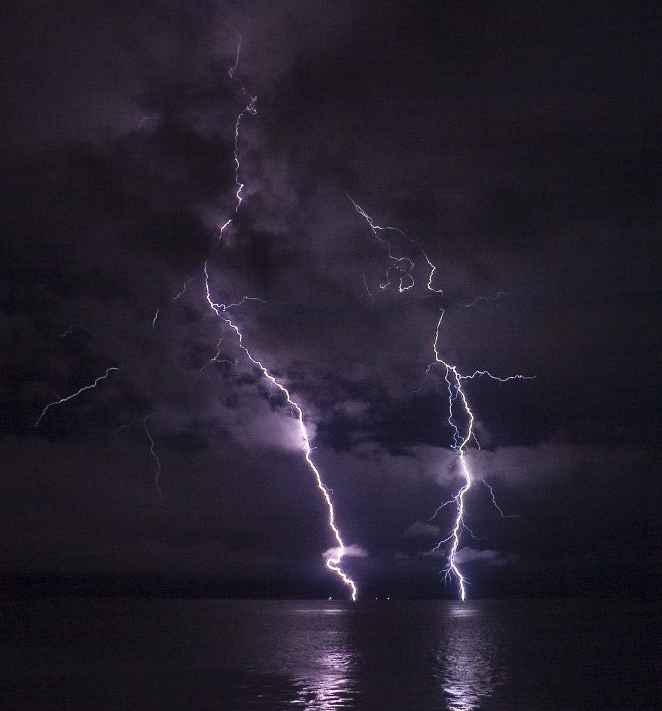 "Phatman - Lightning on the Columbia River (by-sa)" by Ian Boggs from Astoria, US - Lightning on the Columbia River. Licensed under CC BY-SA 2.0 via Wikimedia Commons.