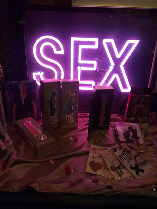 Berlin sex xhop picture with lit Sex sign in window and toys