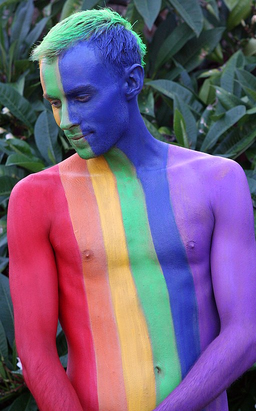 mardi gras bodypainting bodyart man painted in rainbow colors